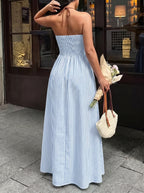 Sleeveless maxi dress with V-neck and halter neck, contrasting striped print